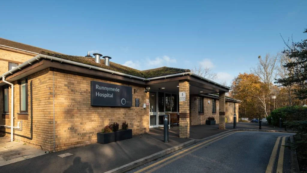 Home A picture of the entrance to the Runnymede Hospital